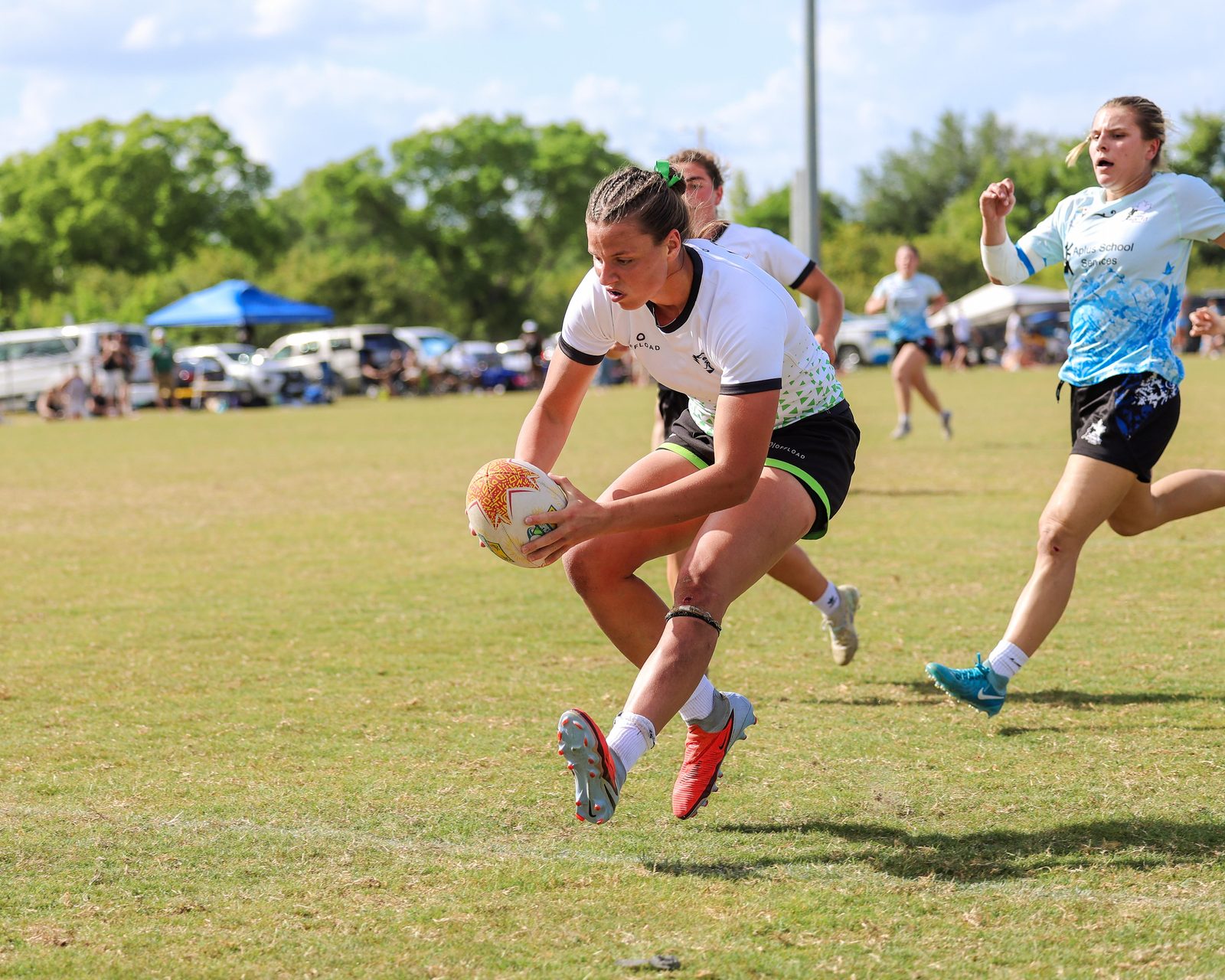 Life U player on a try-line break — Tropical 7s, photo by Mianya's Photography